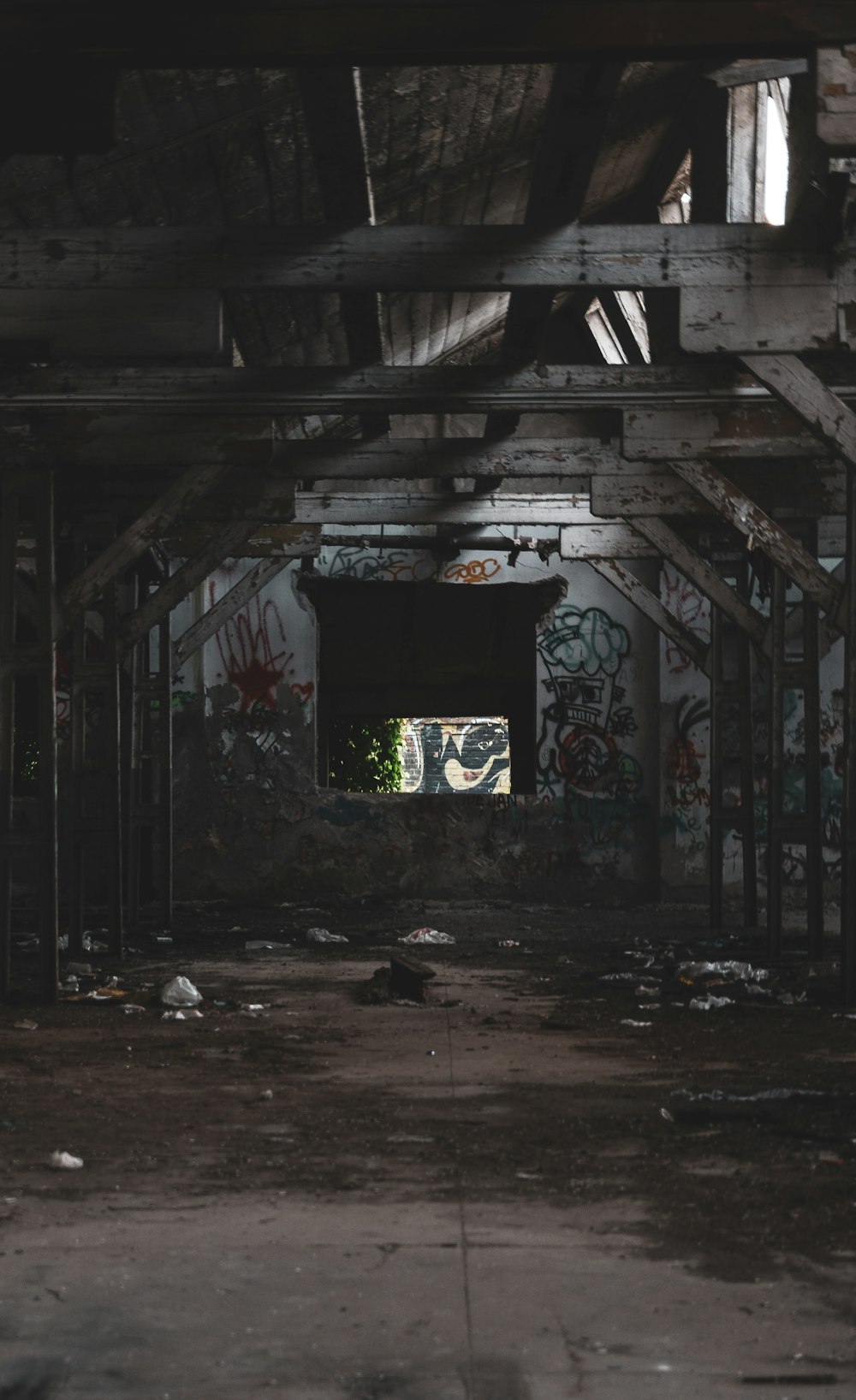 an abandoned building with graffiti on the walls