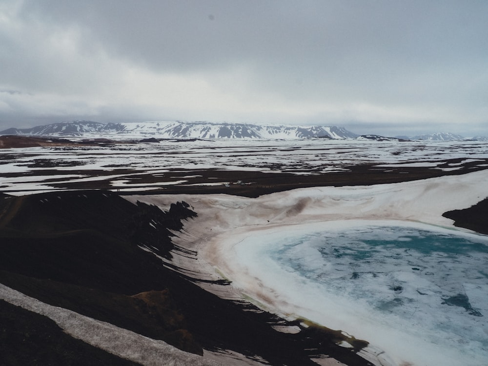 a large body of water surrounded by mountains