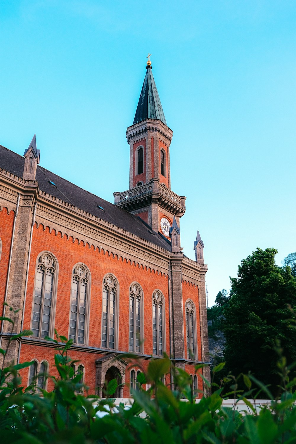 a large brick building with a clock tower