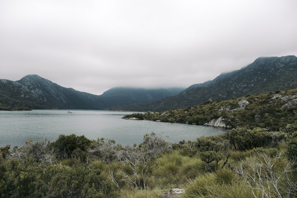 a large body of water surrounded by mountains