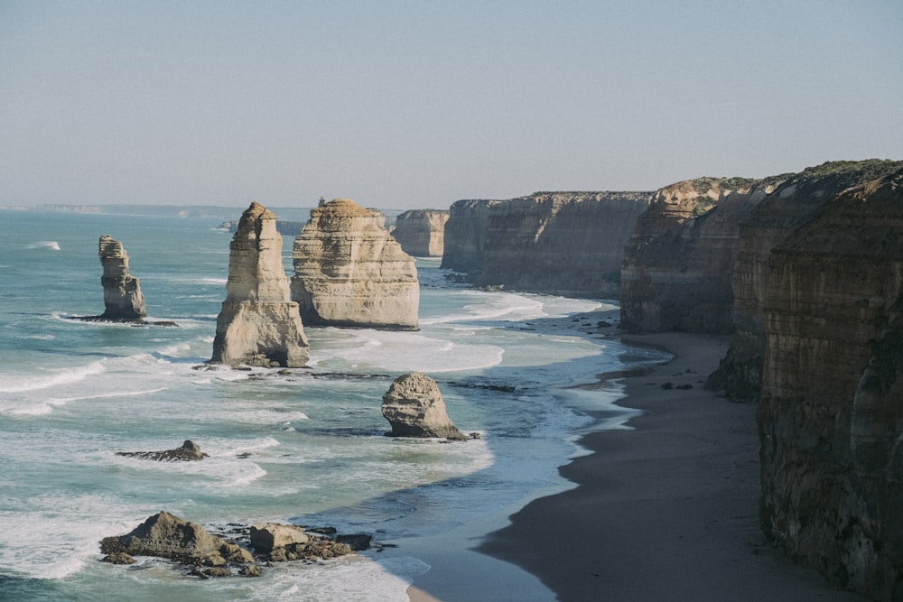 a view of the ocean and rocks in the water