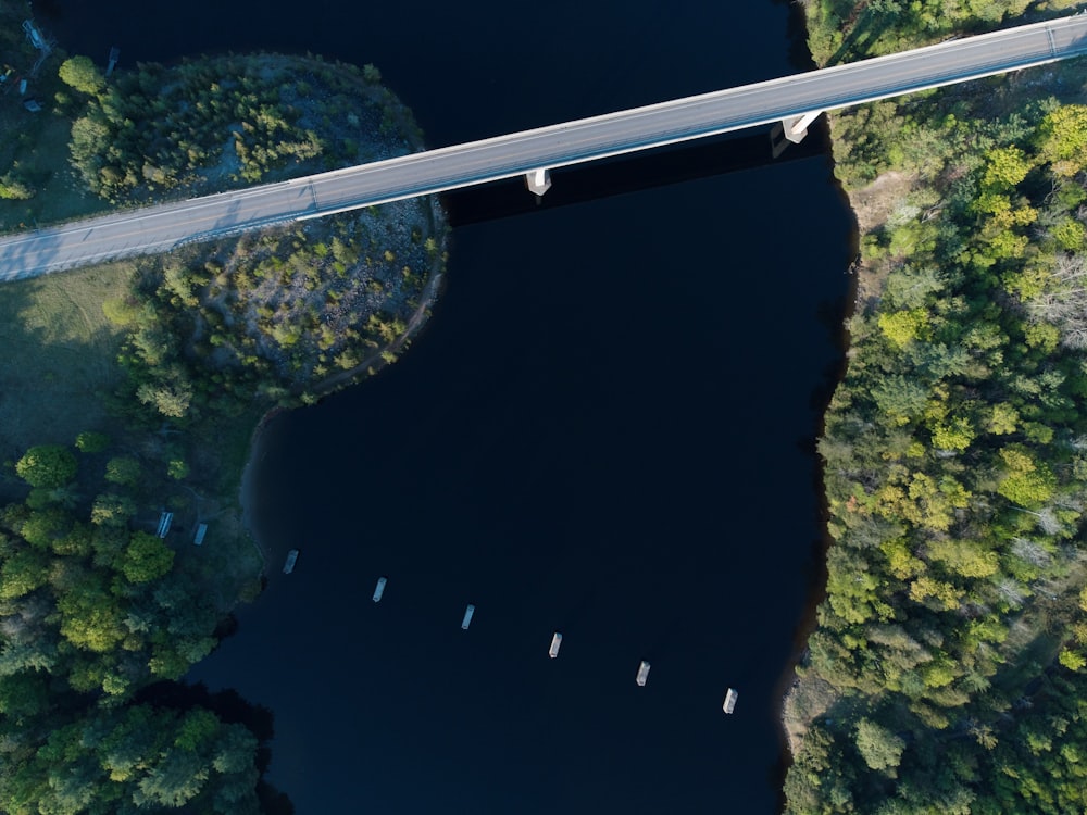 an aerial view of a bridge over a river