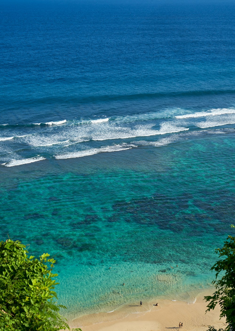 a view of a beach from a hill