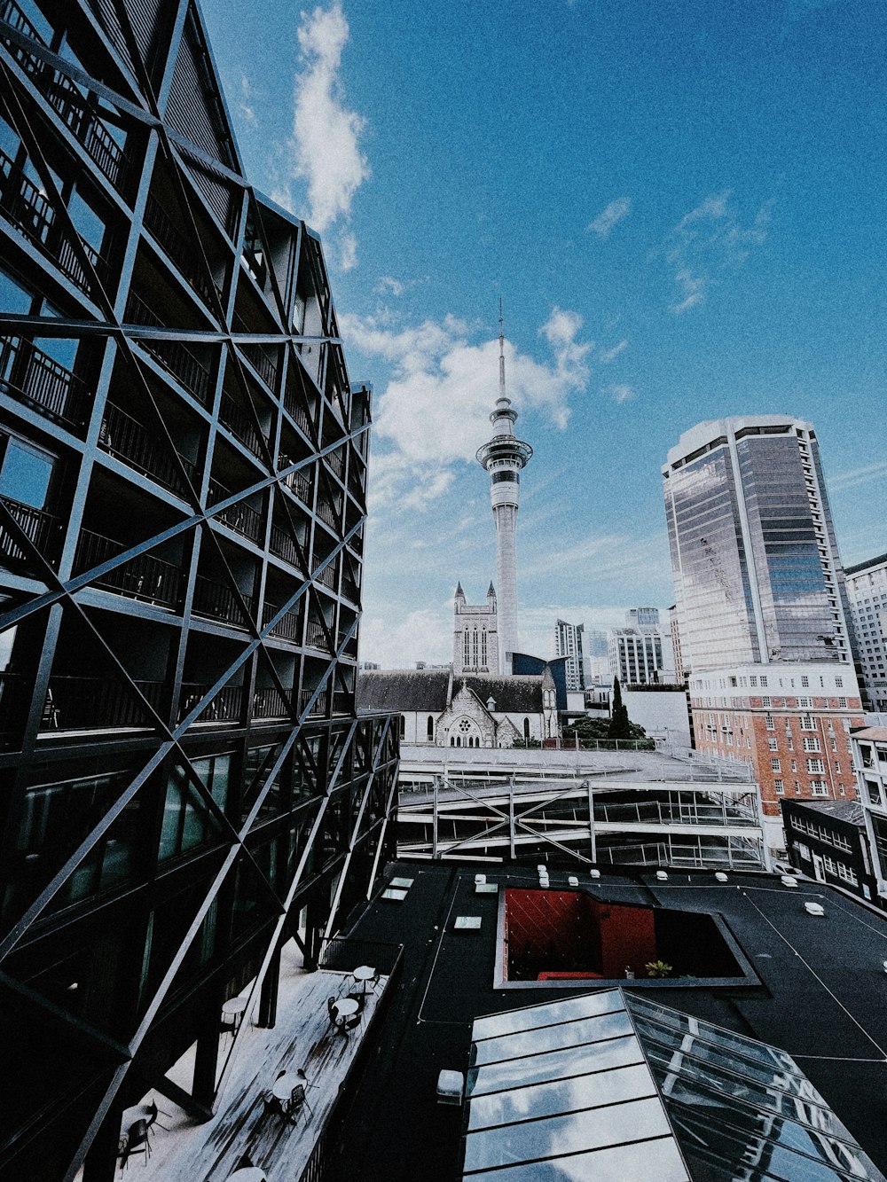 a view of a city from a rooftop of a building