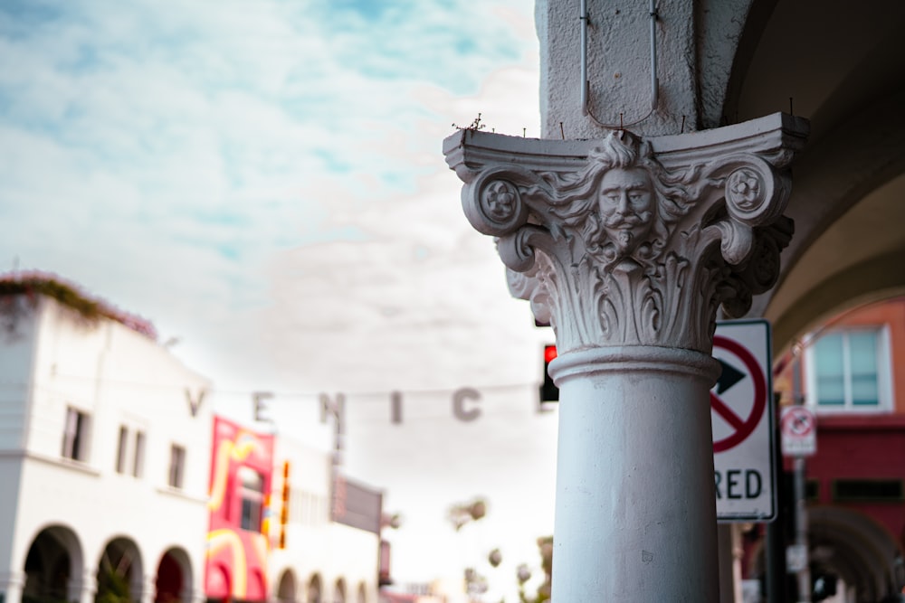 a close up of a street sign on a pole