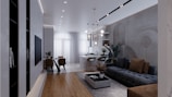a living room filled with furniture and a flat screen tv