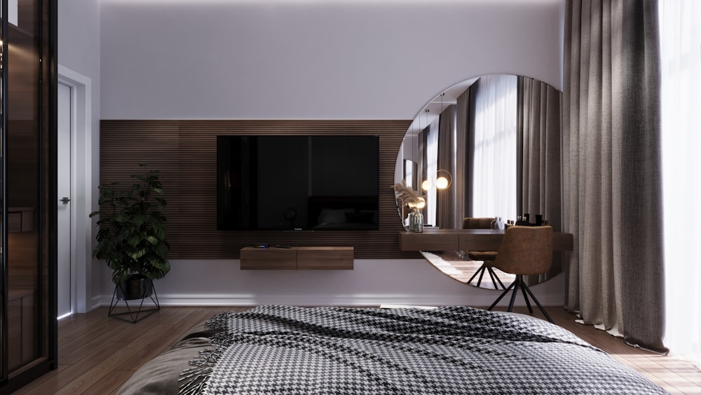a bedroom with a large mirror and a bed