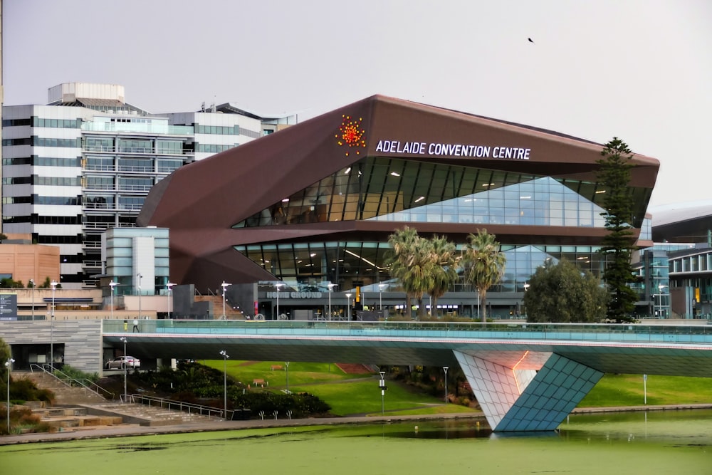 a large building with a bridge in front of it