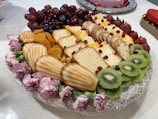 A beautifully arranged food platter with various dishes.