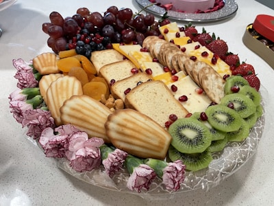 A beautifully arranged food platter with various dishes.