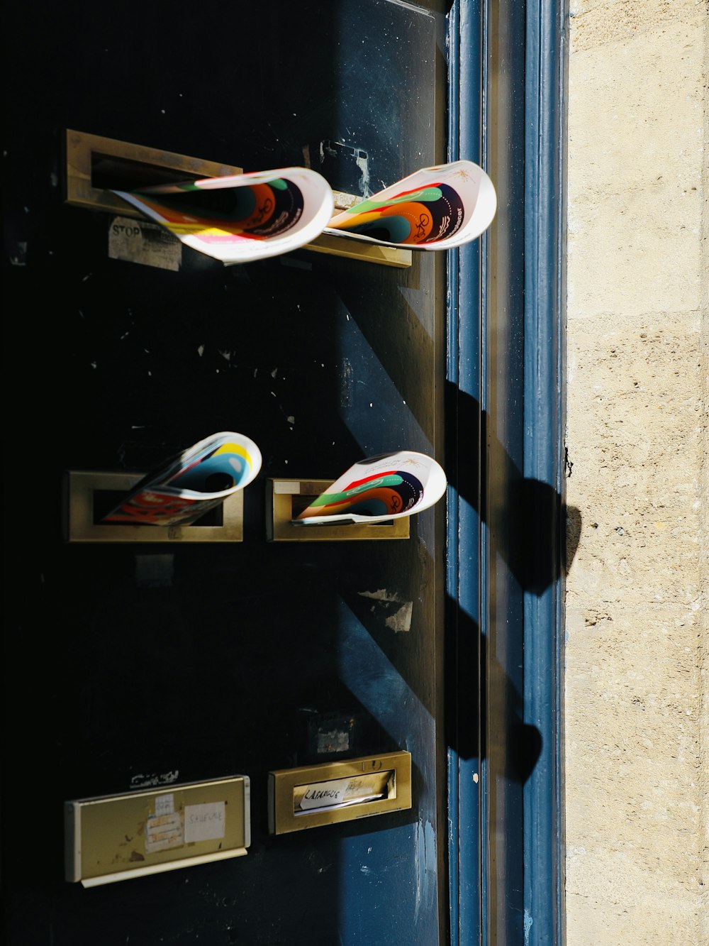 a close up of a door with a bunch of plates on it