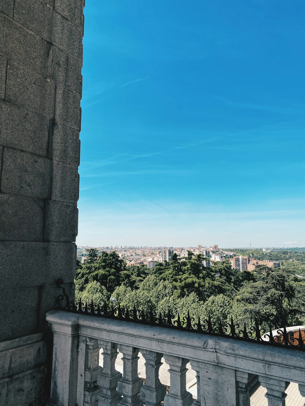 a view of a city from a balcony