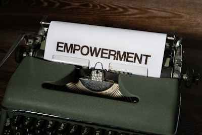 a close up of a typewriter with a piece of paper on it