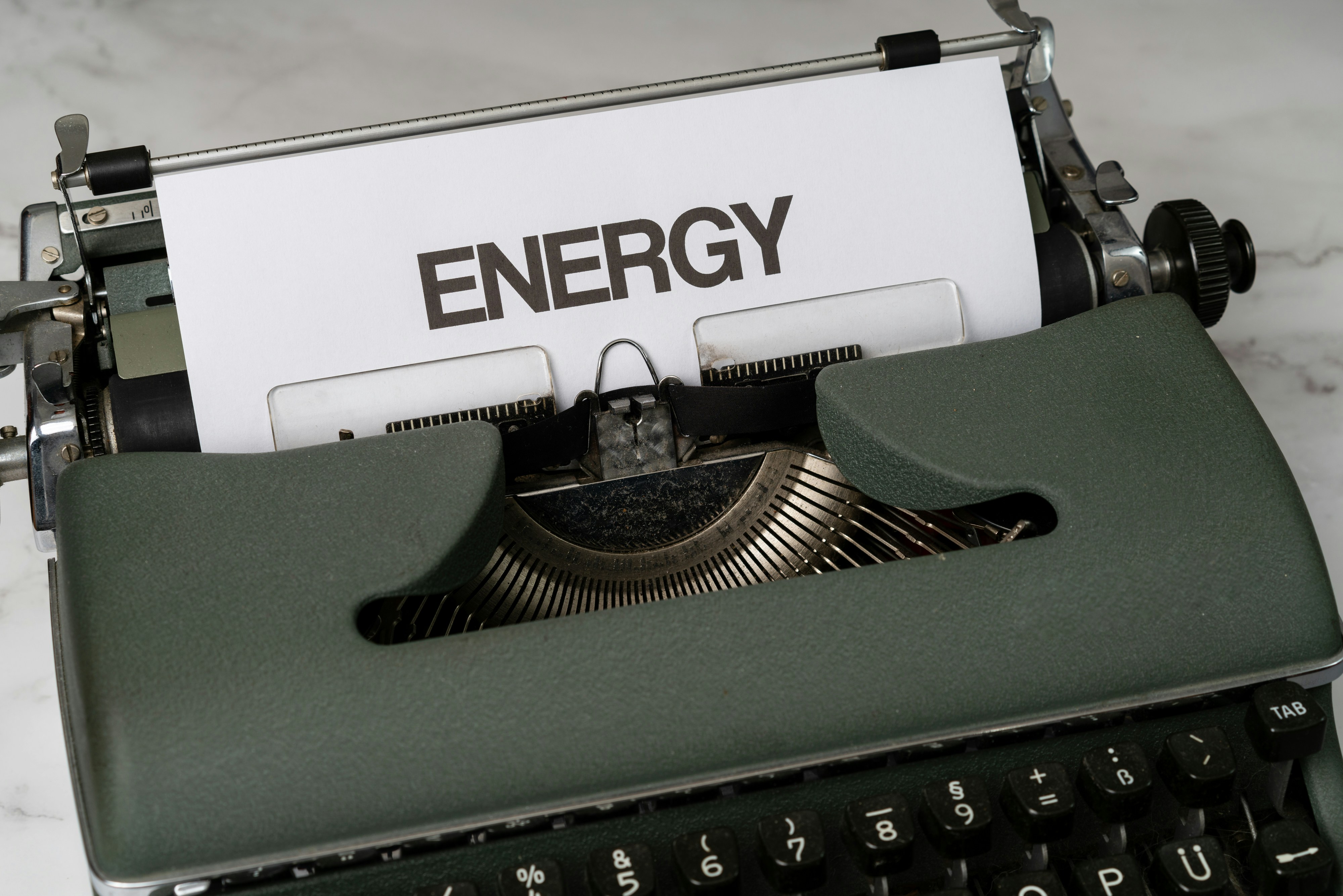 an old typewriter with the word energy printed on it