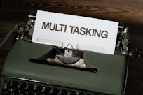 a close up of a typewriter with a paper on it