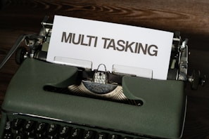 a close up of a typewriter with a paper on it