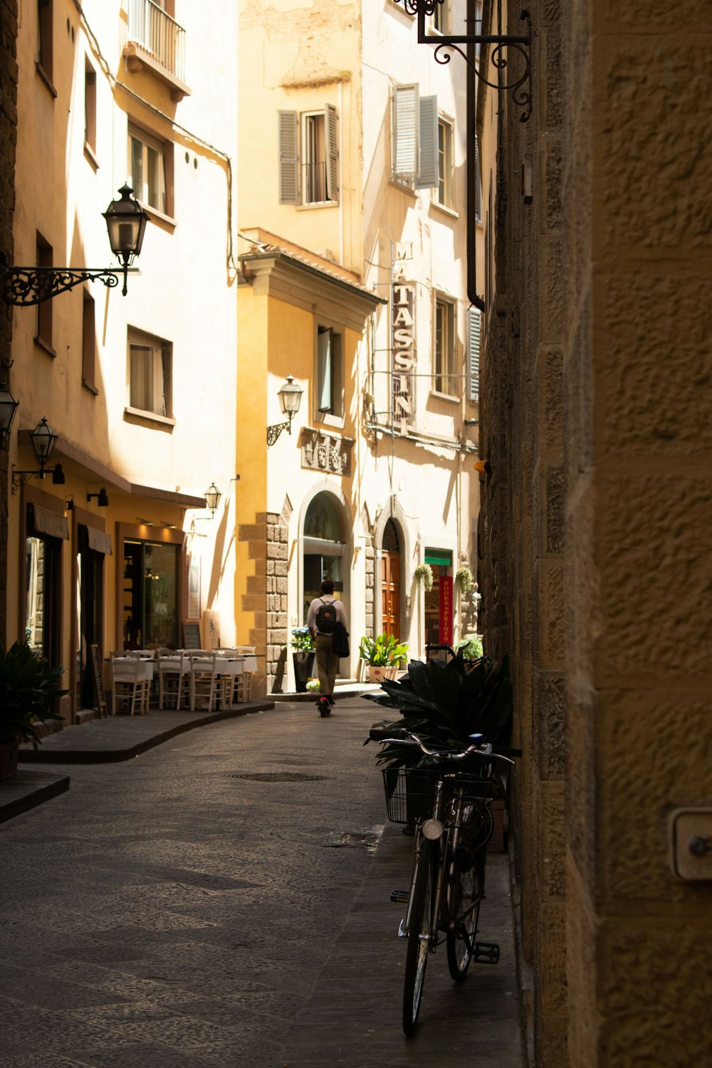 a bike parked on the side of a street