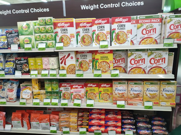 a grocery store shelf filled with lots of food