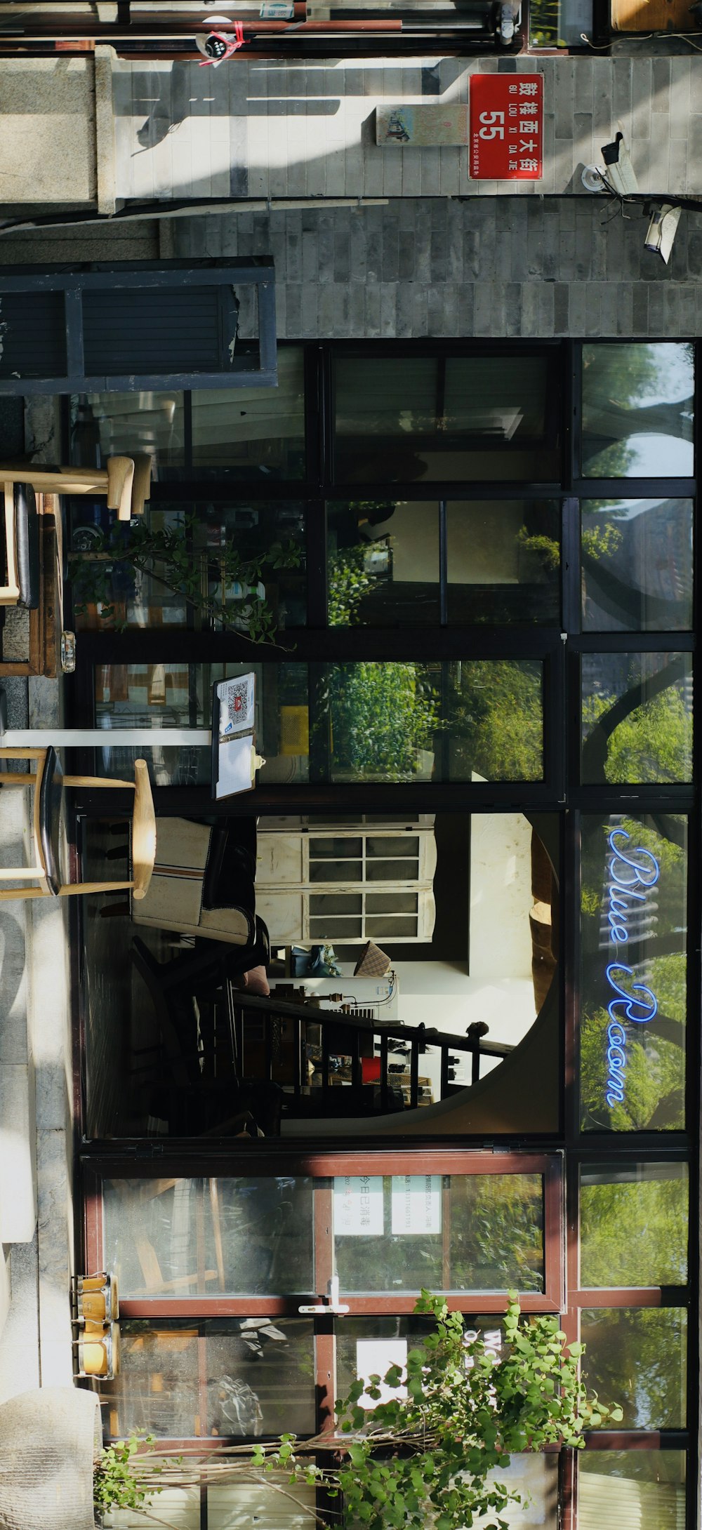 an overhead view of a building with a lot of windows