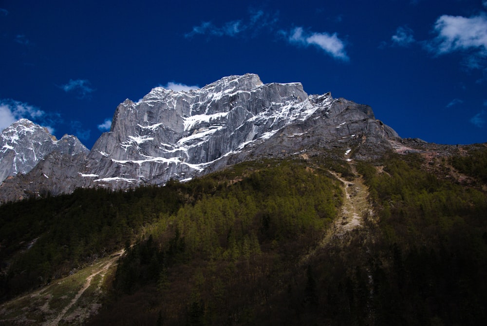 a mountain with a trail going up the side of it