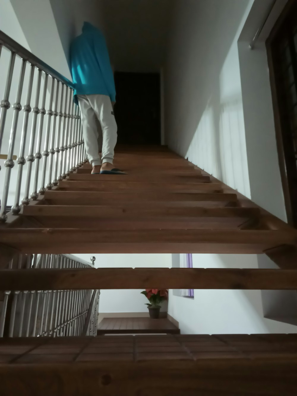 a person walking up a set of stairs