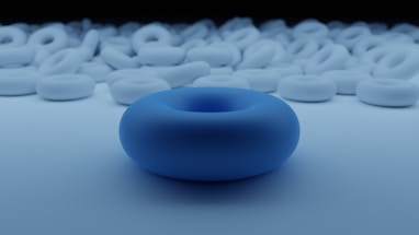 a blue ball sitting on top of a white table