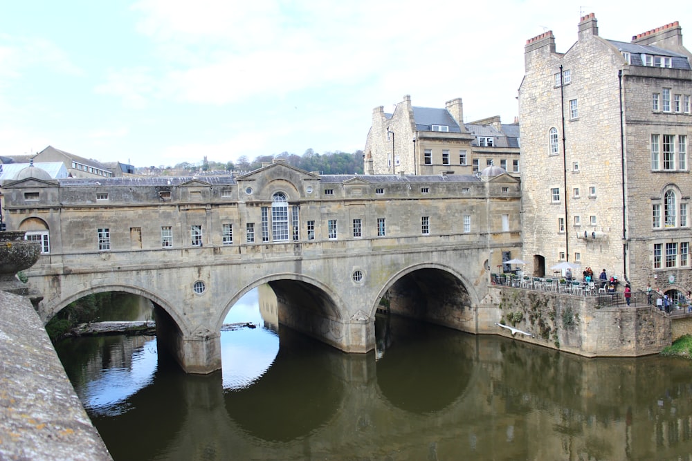 a bridge over a body of water in a city