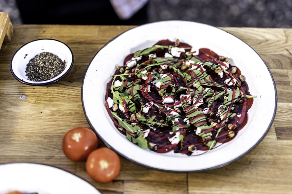 a plate of food on a wooden table