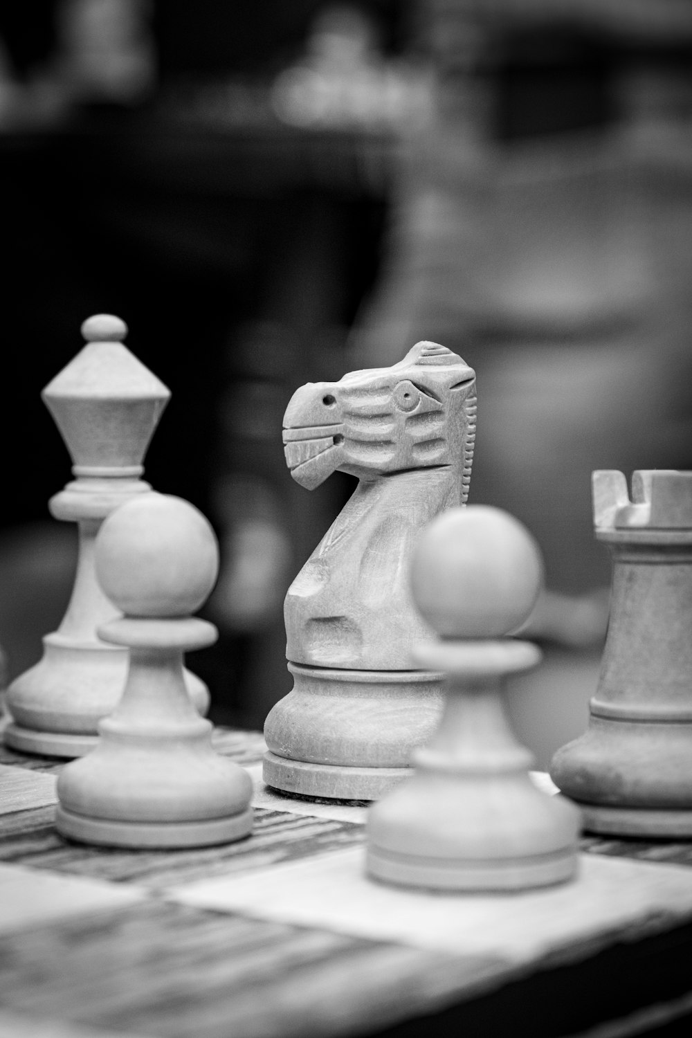 a close up of a chess set on a table