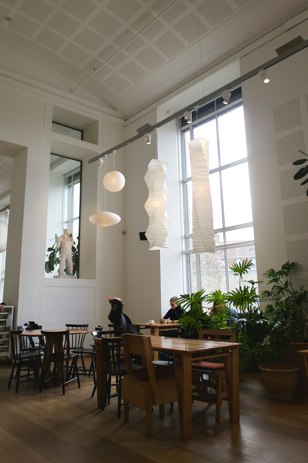 a restaurant with a lot of tables and chairs