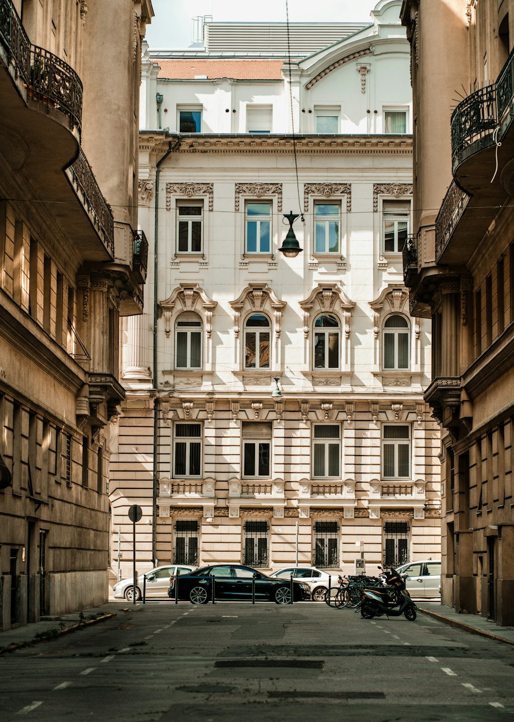 a car is parked in front of a building