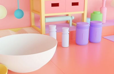 a bathroom with a sink, toilet, and other bathroom accessories