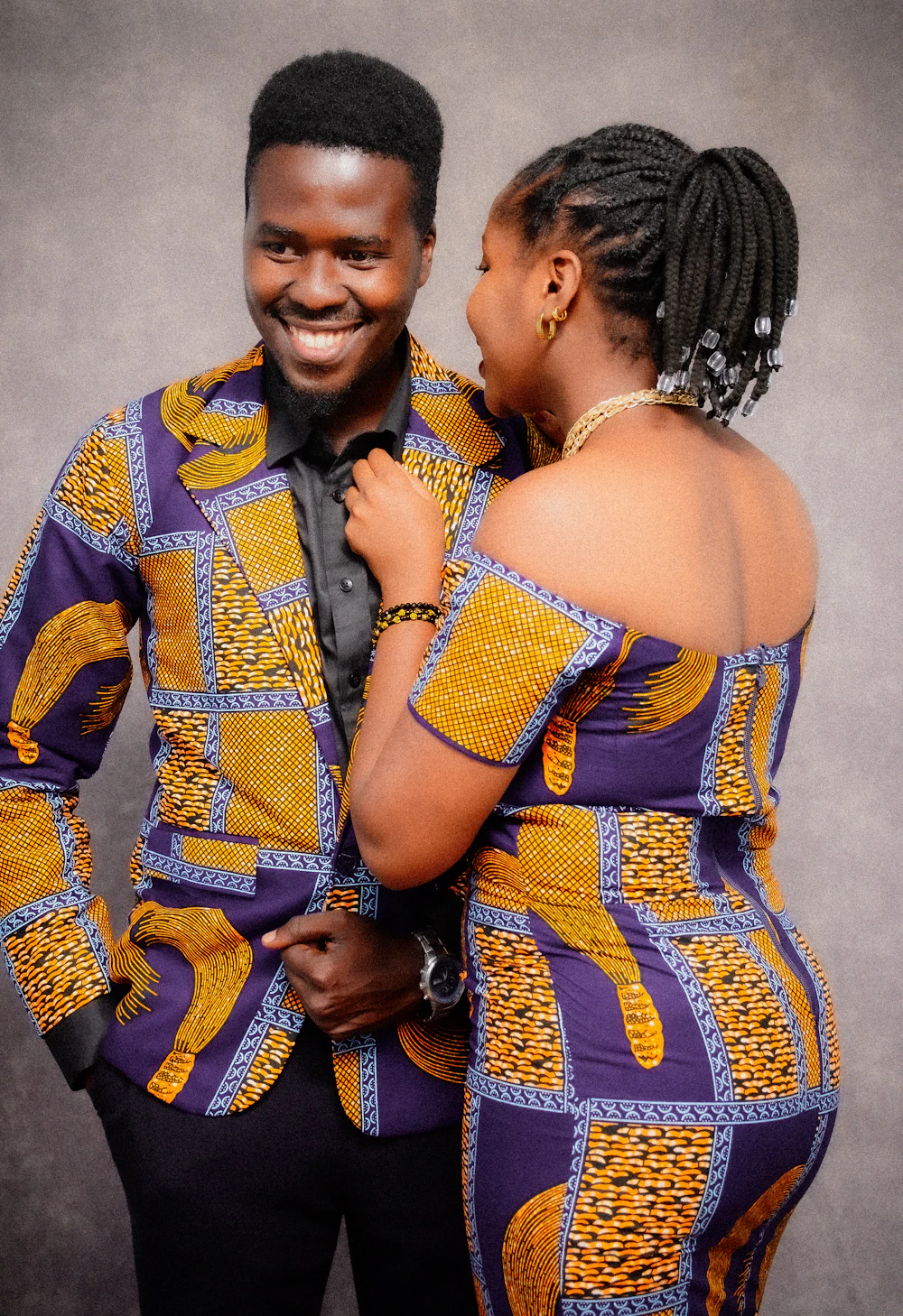 A joyful couple standing close together