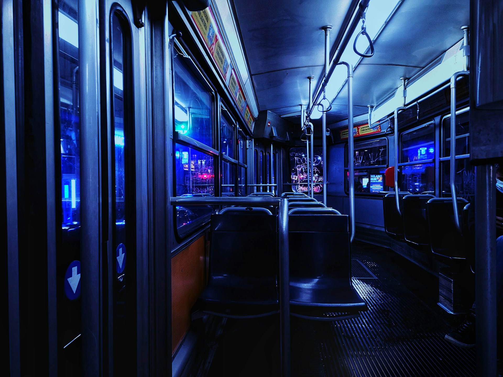 a view of the inside of a bus at night