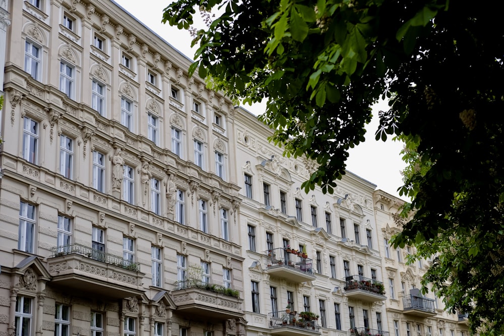 a large building with many windows and balconies