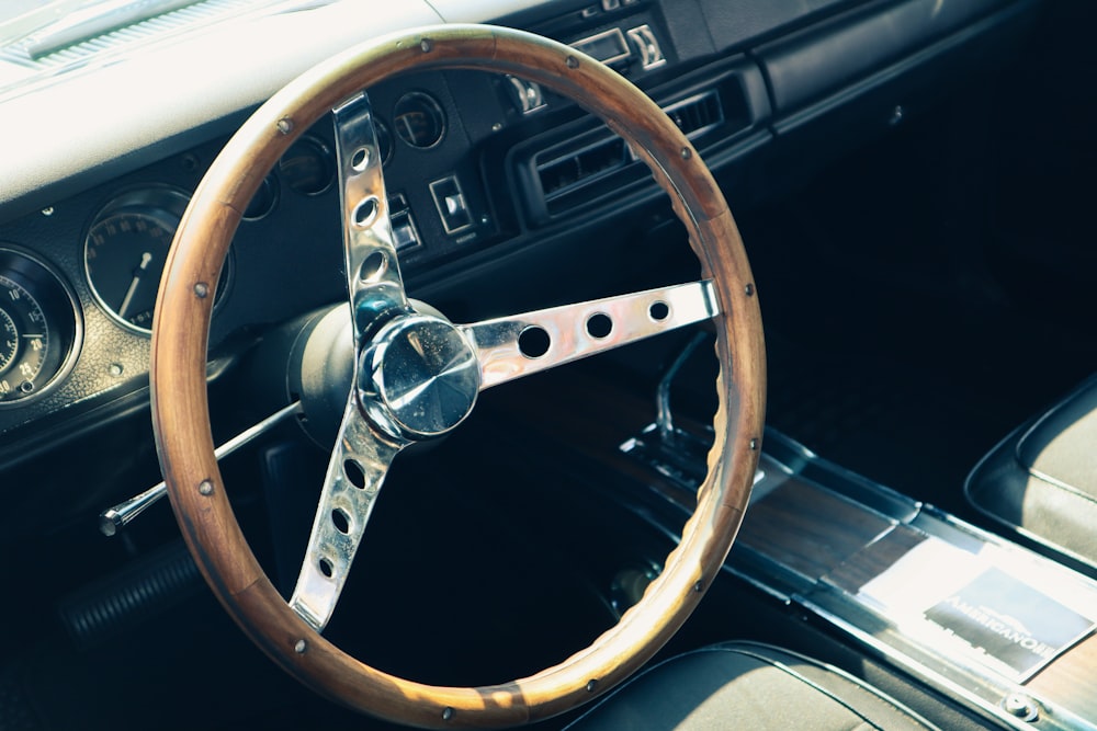 a steering wheel and dashboard of a car