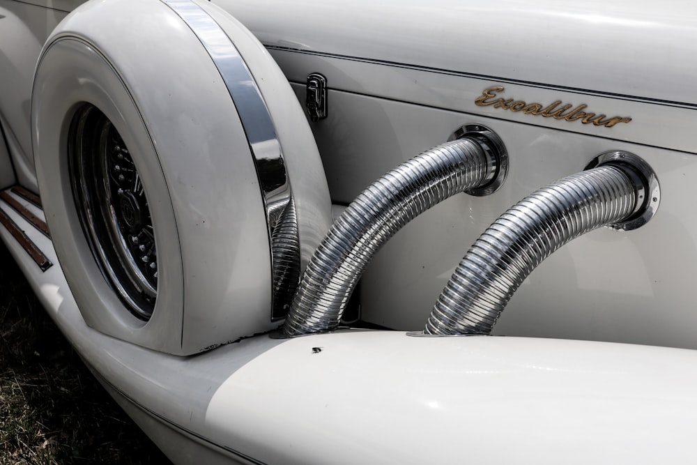 a close up of a car's exhaust system