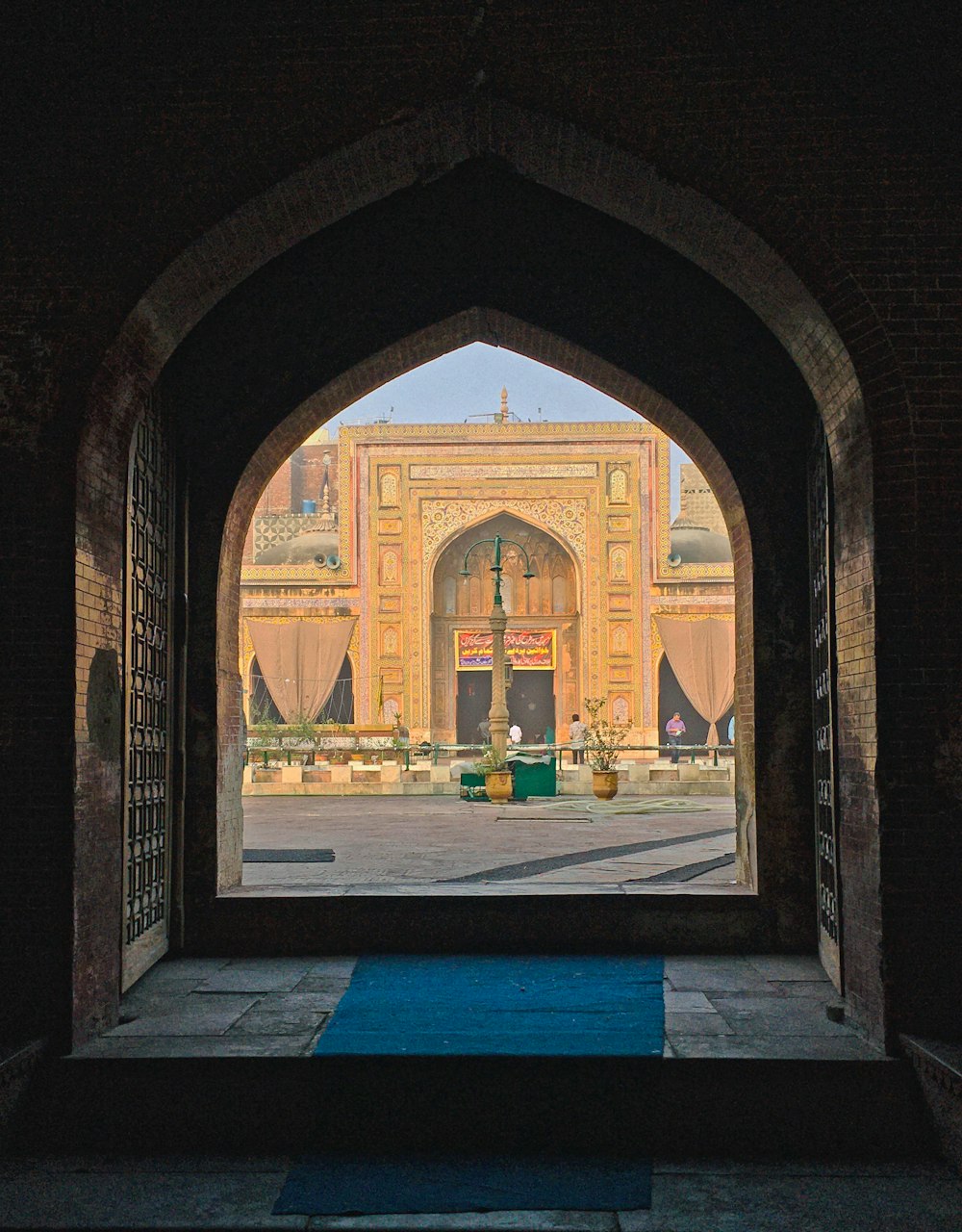 a view of a building through an archway