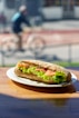 a sandwich sitting on top of a white plate