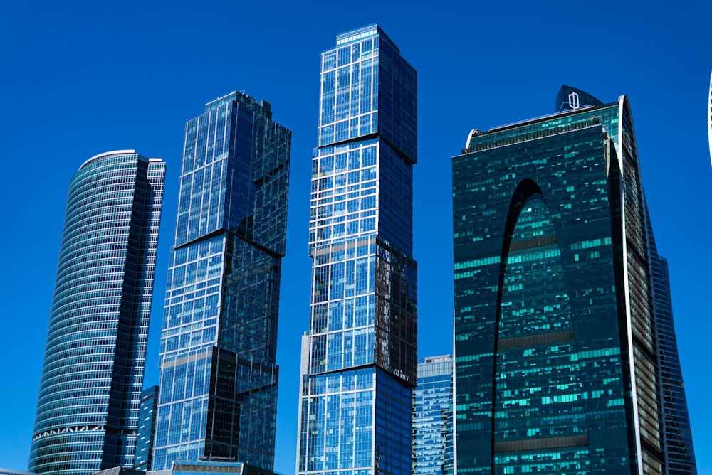 a group of tall buildings in a city