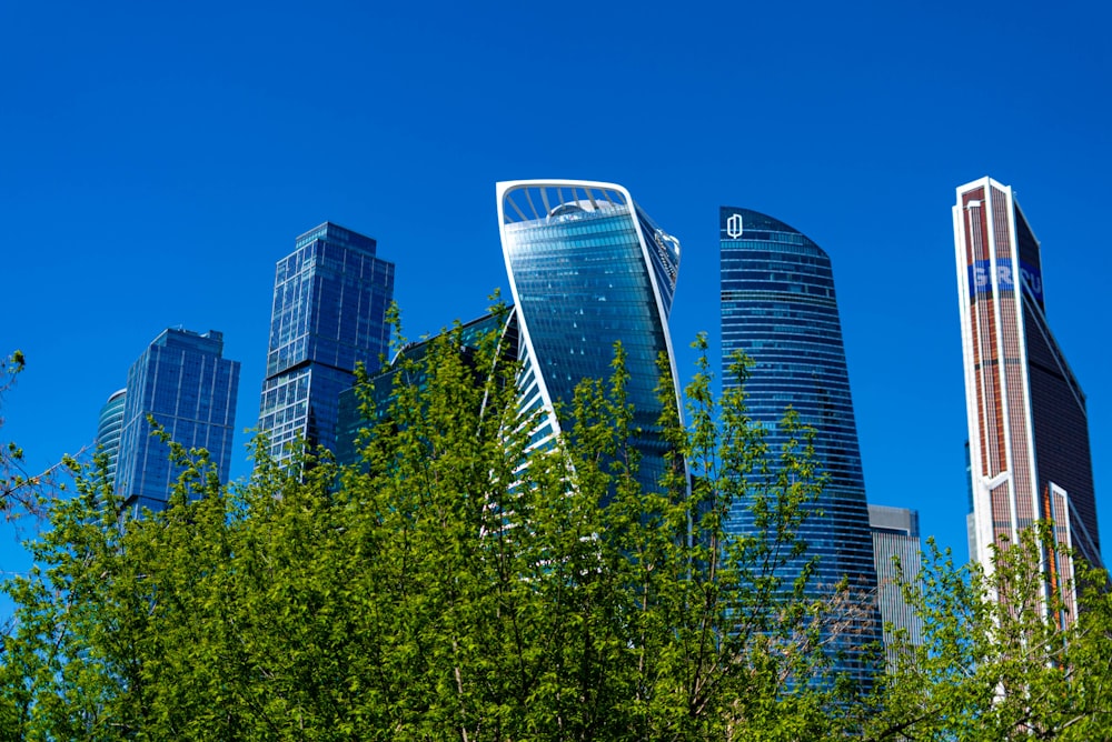 a group of tall buildings sitting next to each other