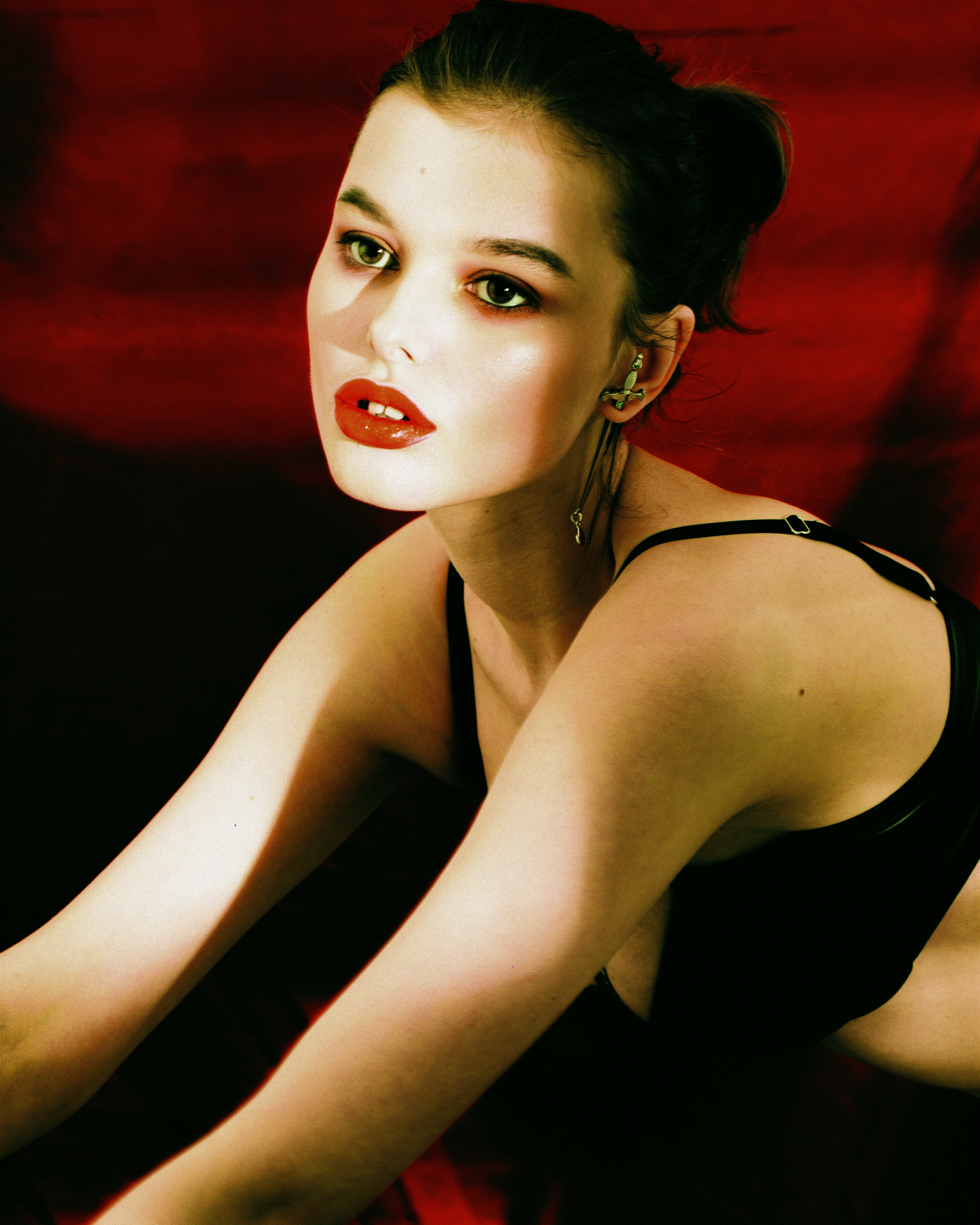 A woman in a black dress with red lipstick photo  Free Brown Image on  Unsplash
