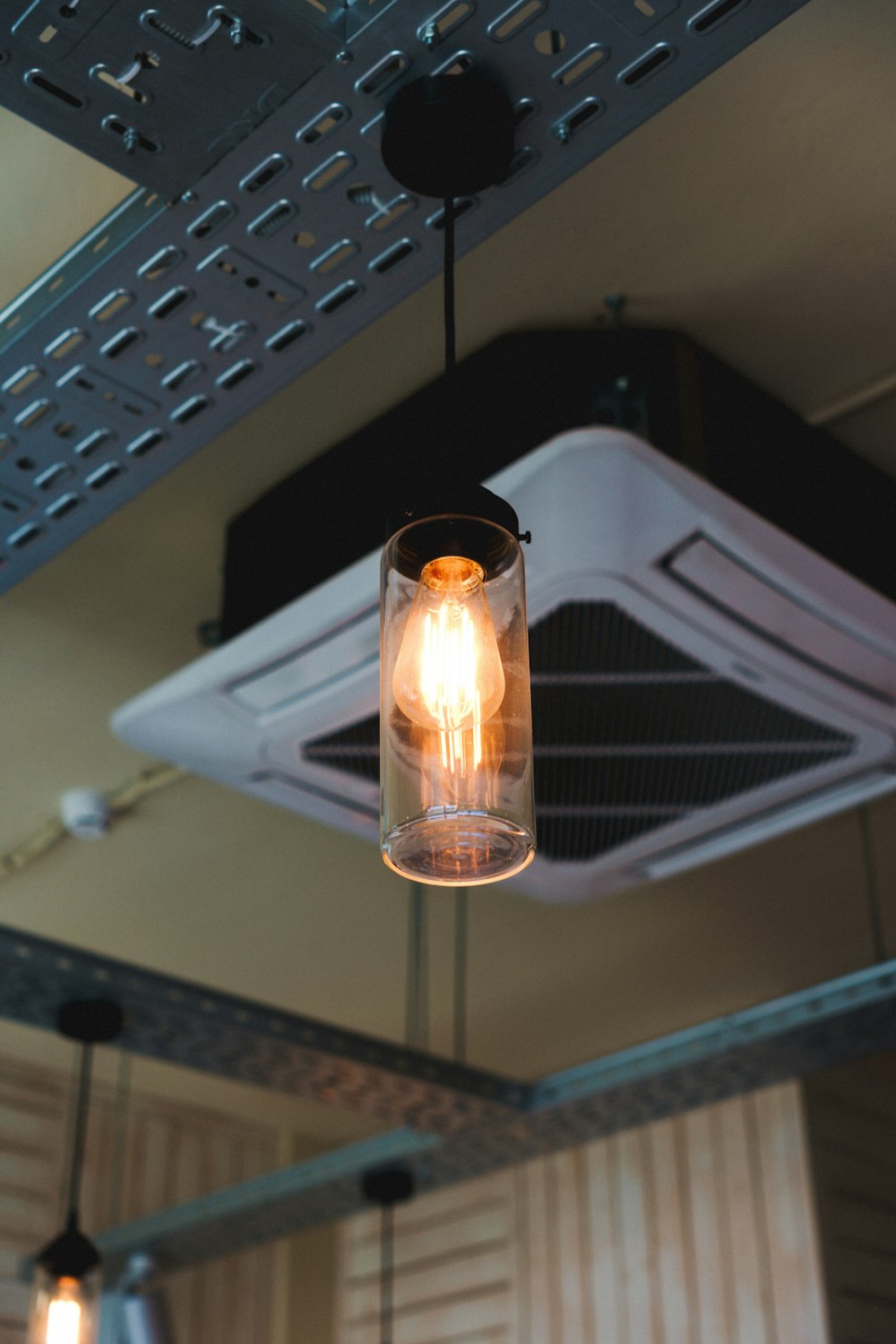 a light bulb hanging from the ceiling of a room