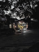 Brightly lit tow truck ready for a night call in South Yorkshire.