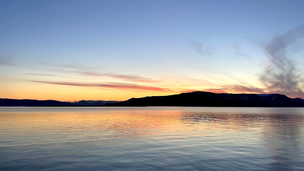 a beautiful sunset over a large body of water