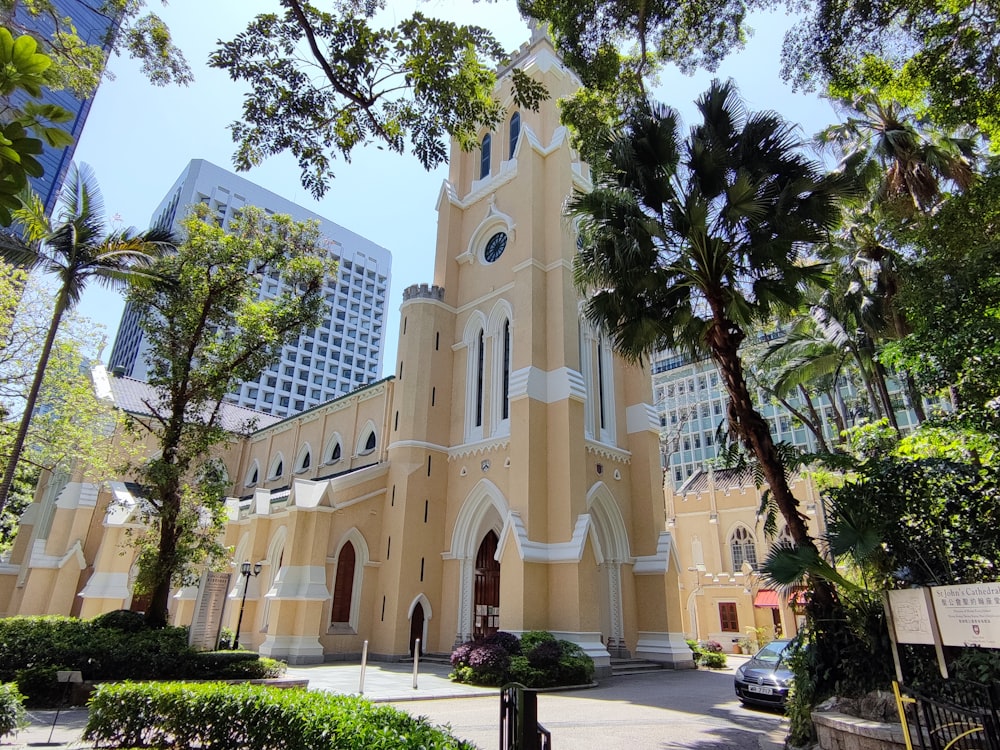 a large church with a clock on the front of it