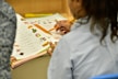 photo of a young person being tutored in math