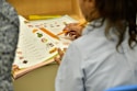 photo of a young person being tutored in math