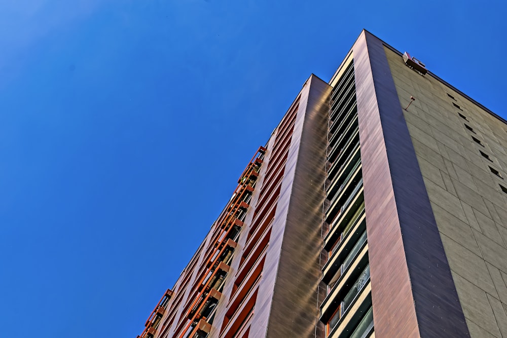 a very tall building with a sky in the background