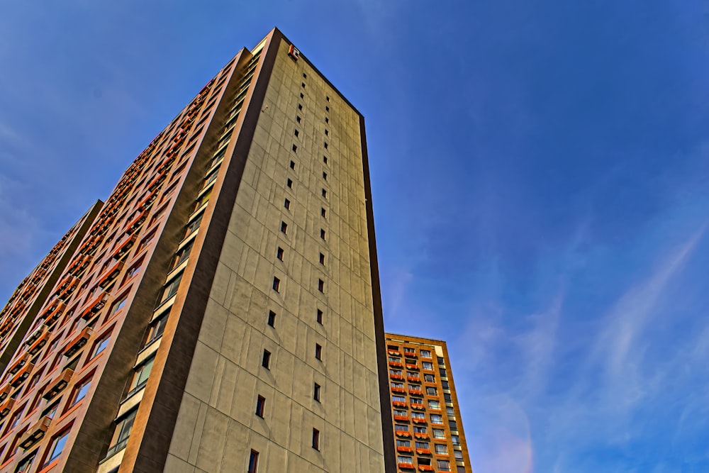 a tall building with a sky background